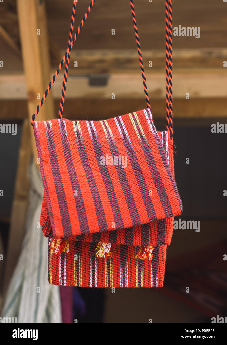Traditional style handmade woven bags made of fabric Stock Photo - Alamy