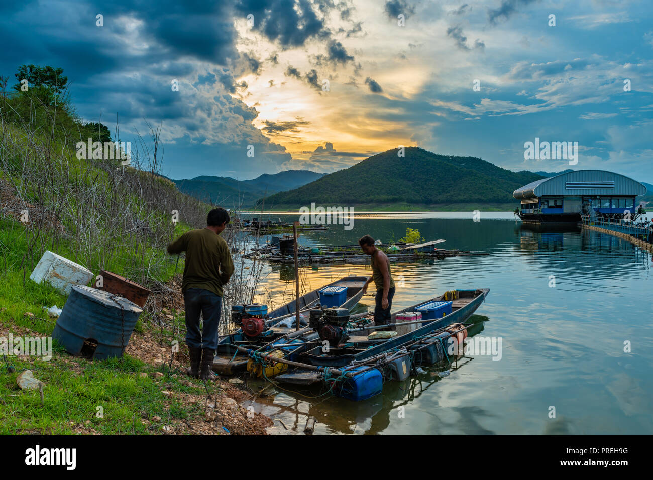 CHIANG MAI, THAILAND - May 26, 2018 :  The fishermen prepare the fishing equipment before night fishing routine in the Mae Guang reservoir Stock Photo