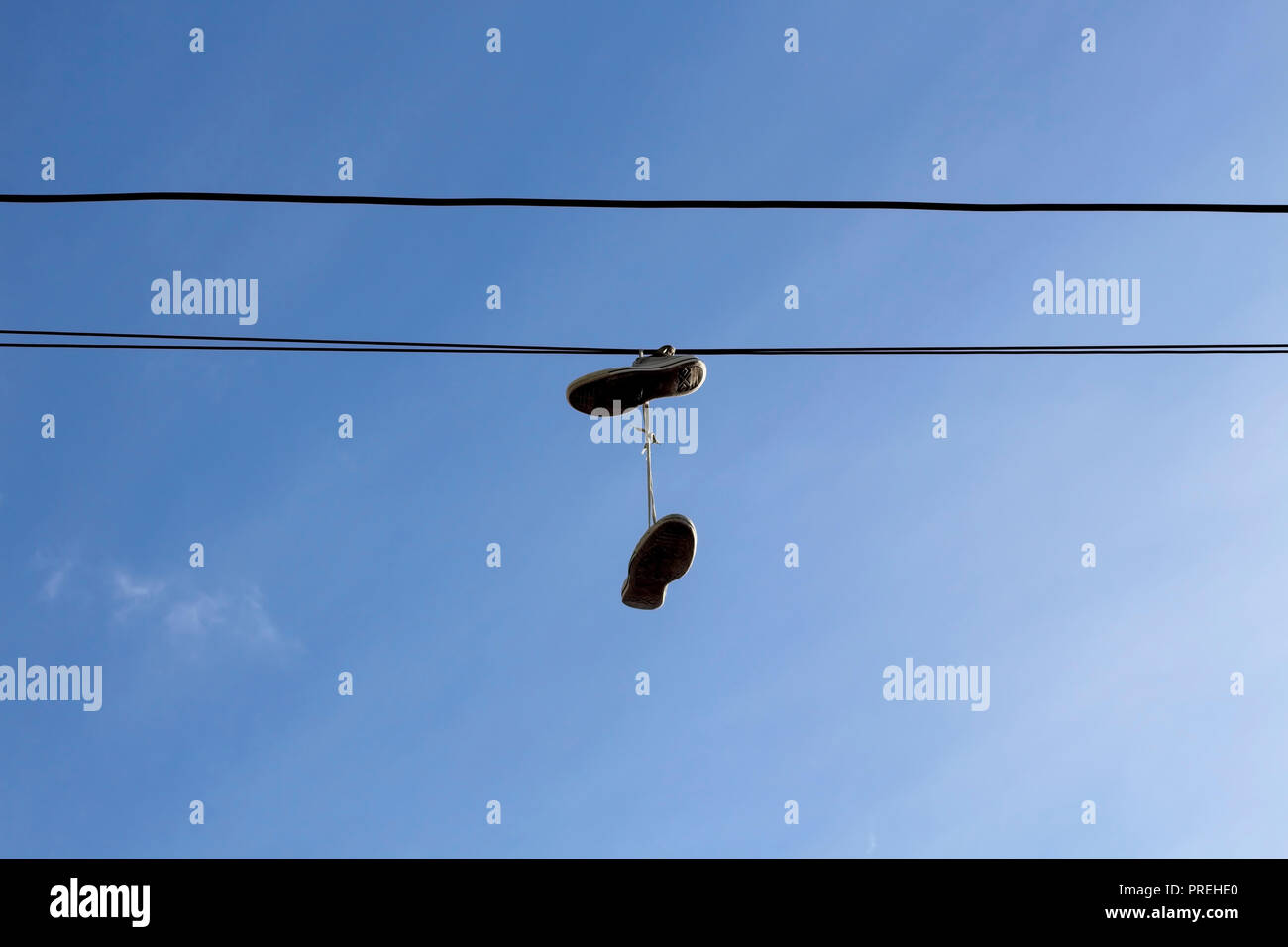 Hanging from electric wire hires stock photography and images Alamy
