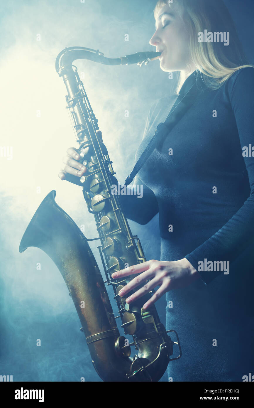 Girl playing sax hires stock photography and images Alamy