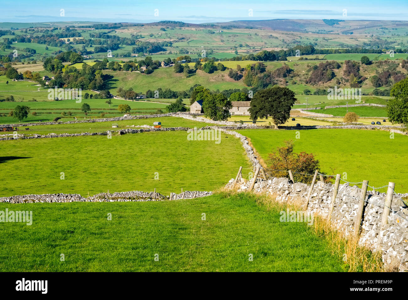 Rolling countryside typical of the White Peak near Hartington in the Peak District National Park, Derbyshire, UK Stock Photo