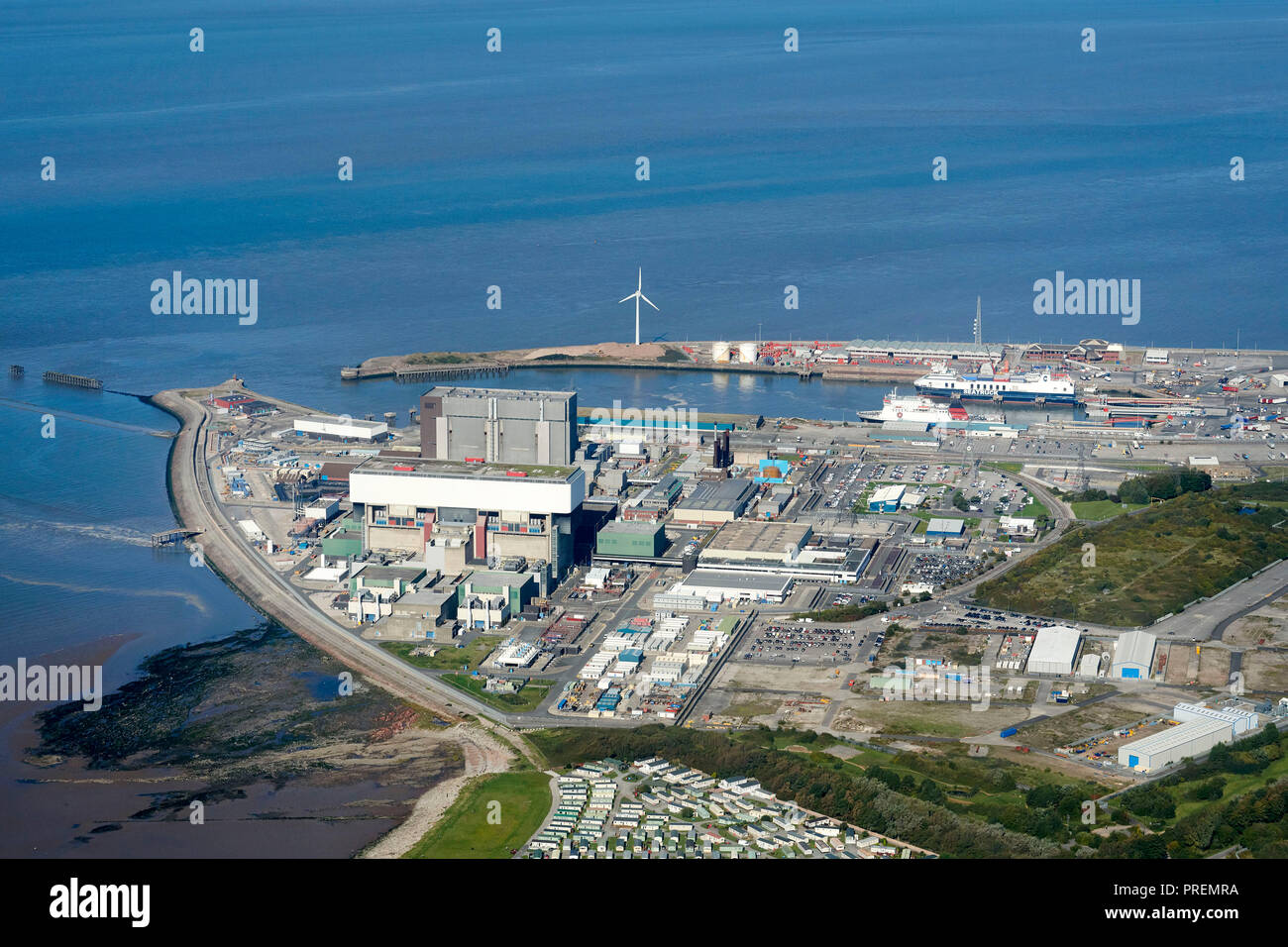 An aerial photo of Heysham Port, north west England, UK, on the edge of Morecambe bay, Isle of Man ferry in port, Nuclear power station prominent Stock Photo