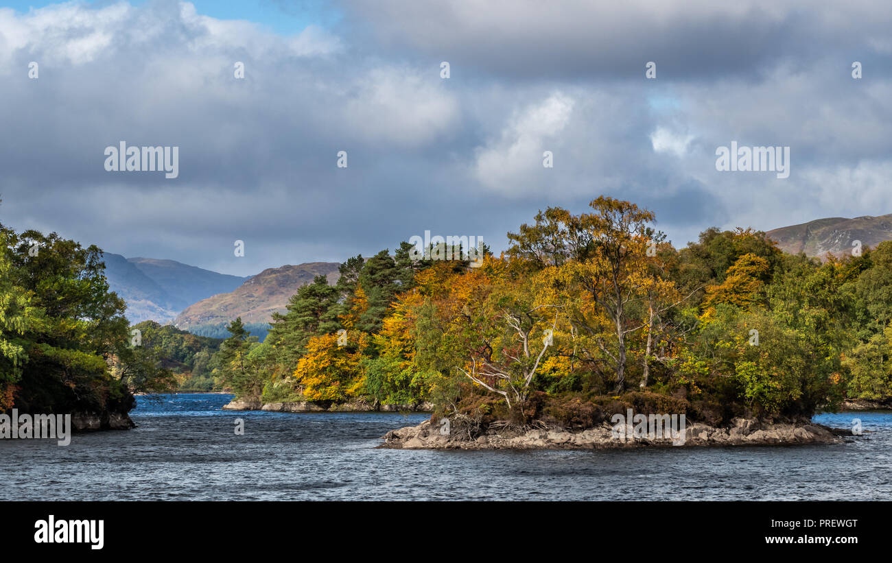 A blustery autumnal day at Loch Katrine the source of much of Glasgows drinking water. It is a scenic attraction in the Trossachs area of Scotland Stock Photo