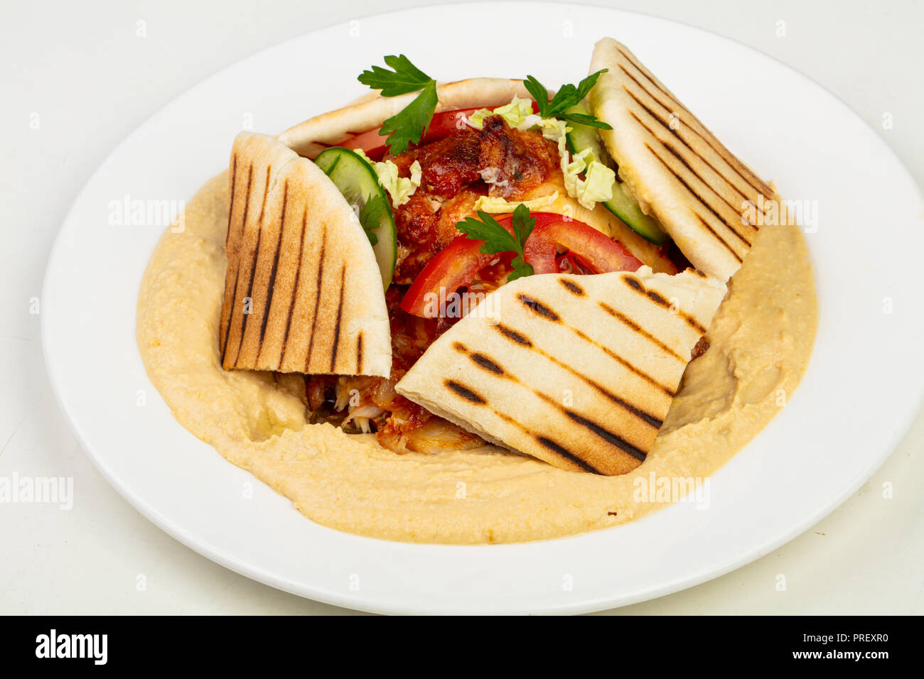Humus with shawarma and pita Stock Photo - Alamy
