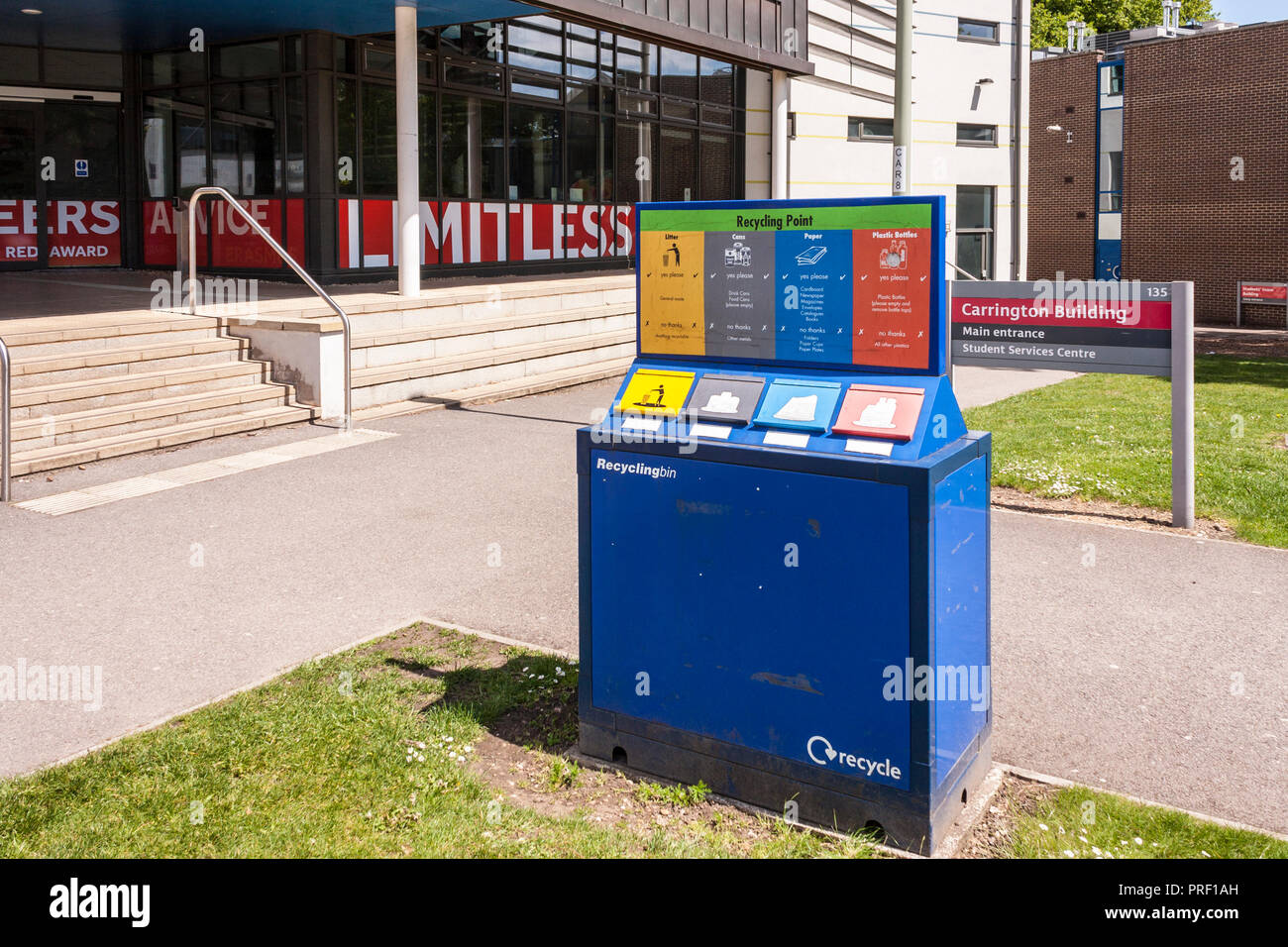 Recycling point on university campus with separate bins for litter, paper, cans and plastic bottles Stock Photo