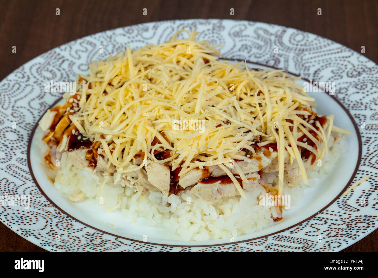Rice with teriyaki chicken and cheese Stock Photo Alamy