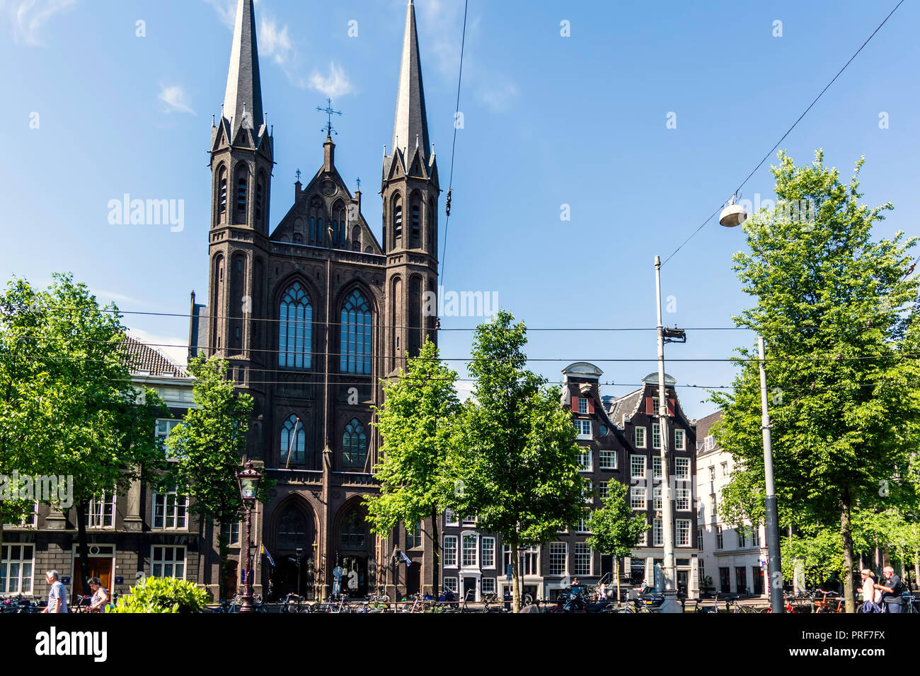 Amsterdam, Netherlands - May 21, 2018: Facade of the Neo-Gothic Roman Catholic church called De Krijtberg Kerk. Stock Photo