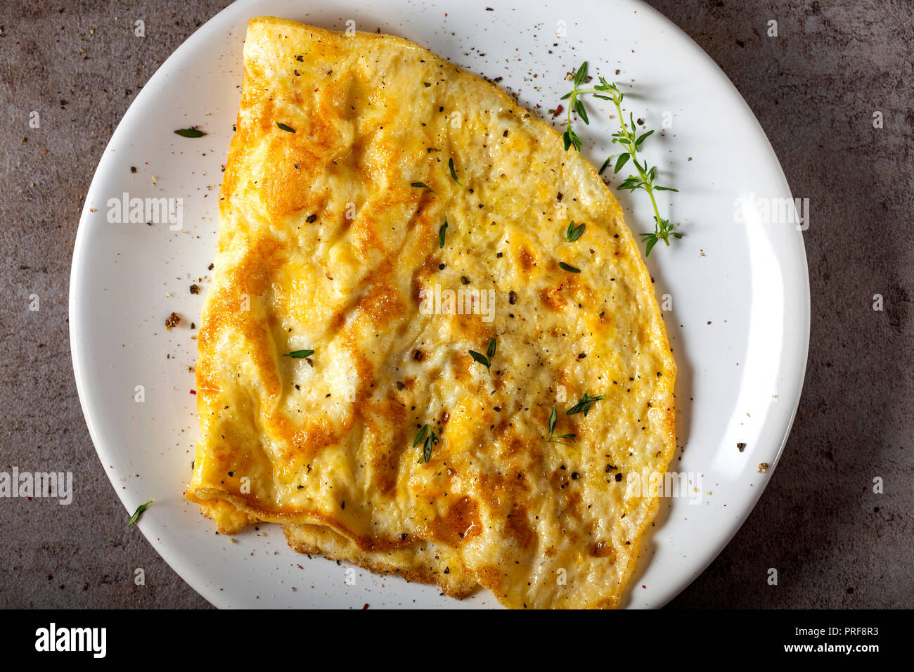 Scrambled Eggs Or Omelette Made From Eggs And Cheese With Herbs On The Plate Top View Stock Photo Alamy Scrambled Eggs Or Omelette Made From Eggs And Cheese With Herbs On The Plate Top View Stock Photo Alamy