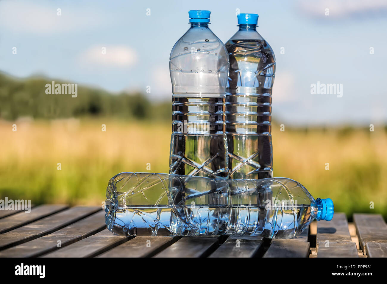 drinking water in plastic bottles outdoors Stock Photo Alamy