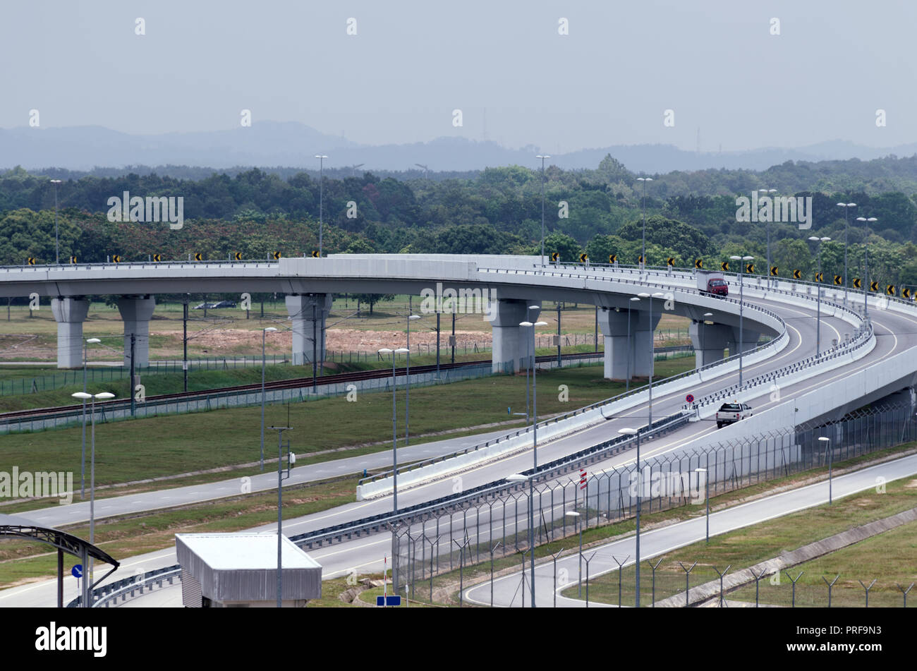 Aerial wiew of modern highway and overpass. Concept of unloading of city road network. Stock Photo