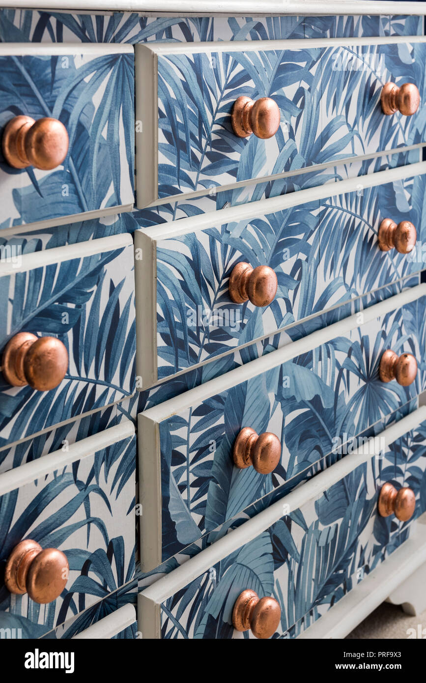 Upcycled chest of drawers with leaf pattern Stock Photo