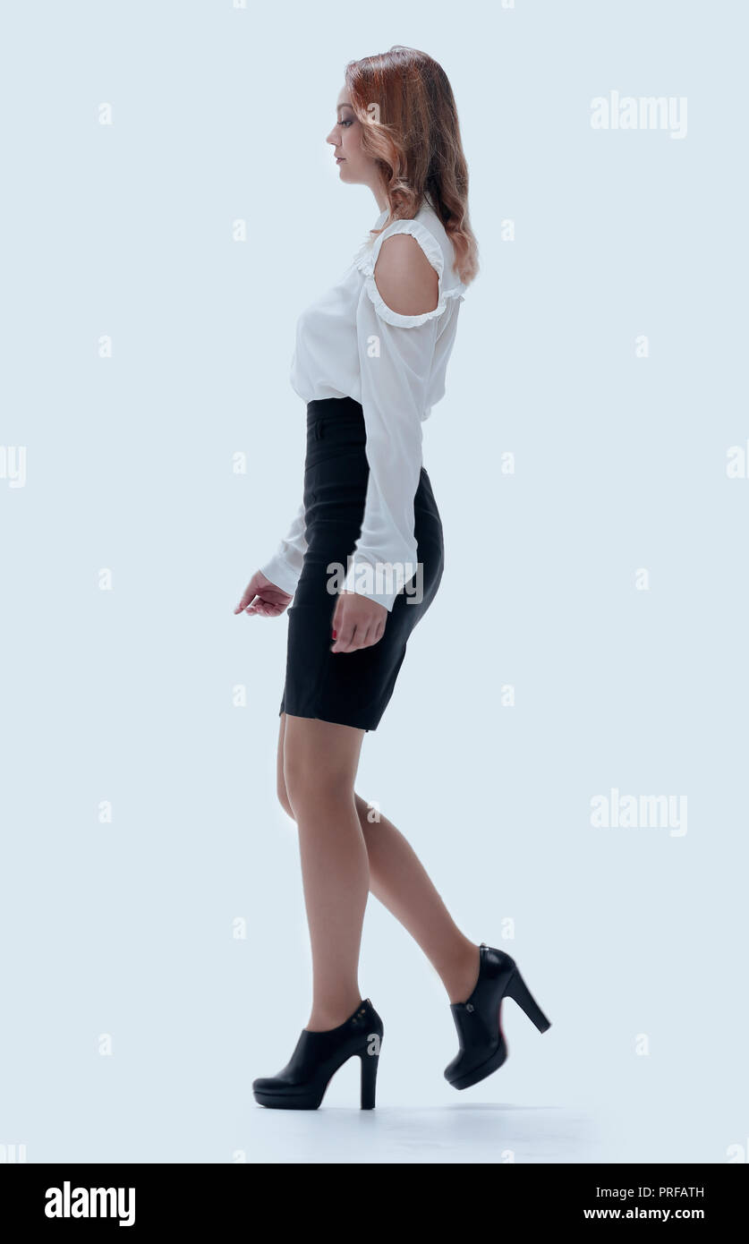 walking business lady, side view Stock Photo - Alamy