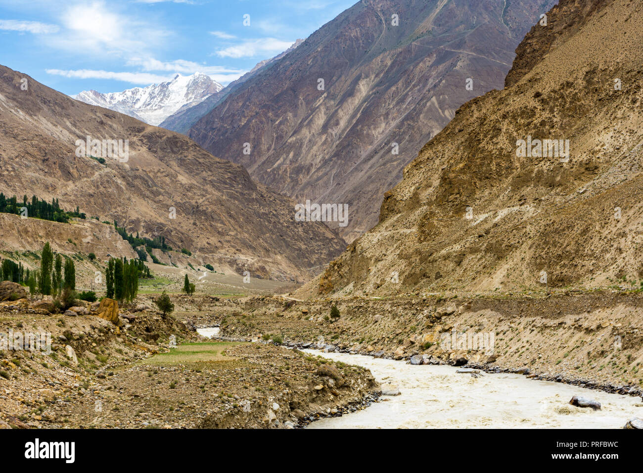 Braldu river flowing between mountains near Skardu, Gilgit-Baltistan, Pakistan Stock Photo