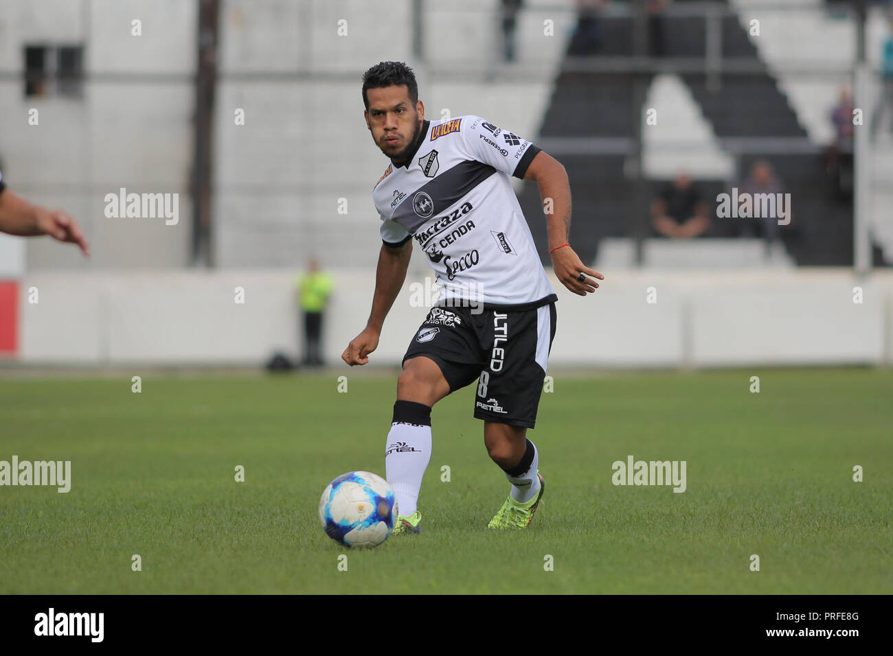 The football player, Hugo Soria, stands with the ball during a football match of the argentinian league in Buenos Aires, 30 of april of 2018 Stock Photo