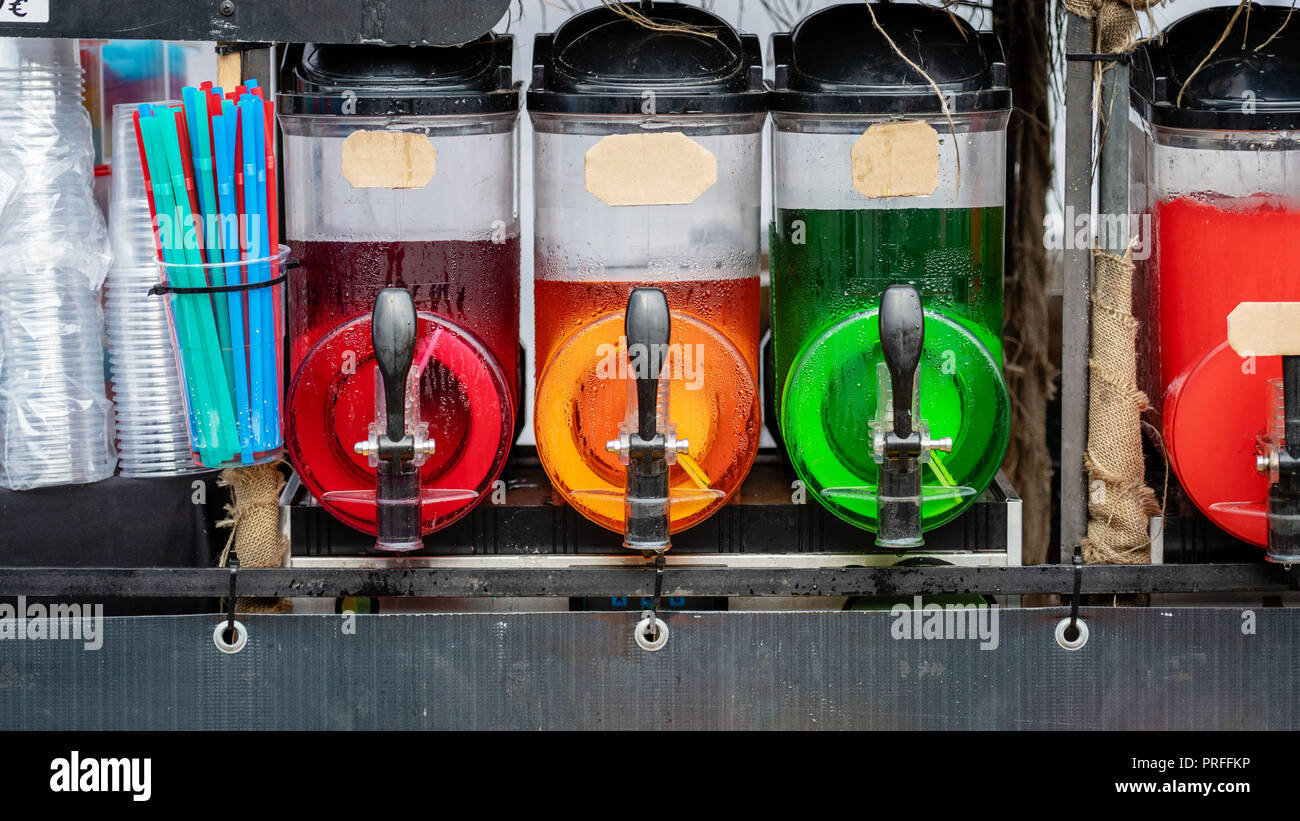 Slush ice drink containers with colorful ice drinks Stock Photo Alamy