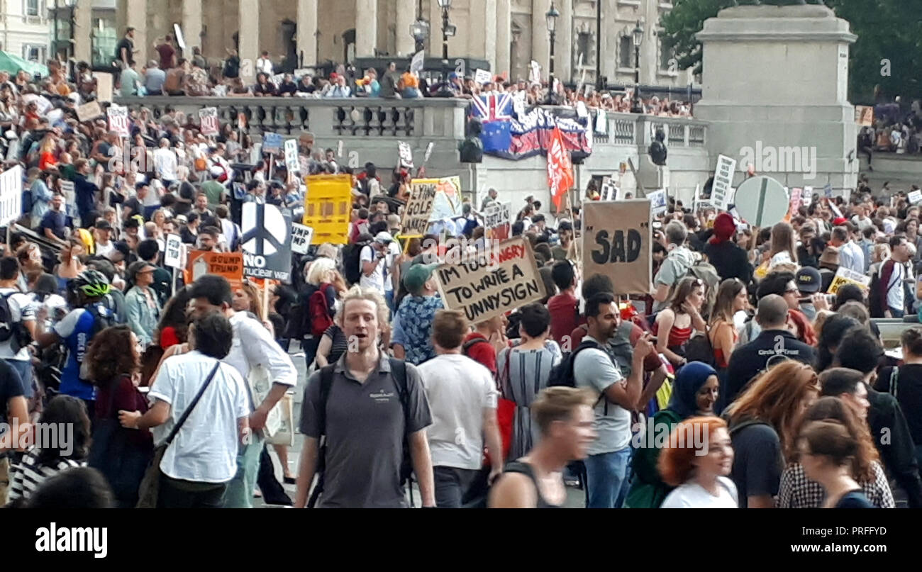 London UK, 13th July 2018. 100,000 people protest against the visit of the US President Donald Trump. The protesters gather in Trafalgar Square. Stock Photo