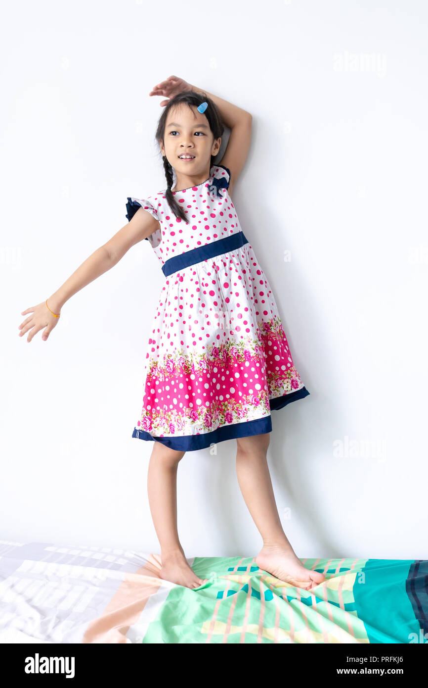 Little Asian girl portrait in sweet vintage dress Stock Photo - Alamy