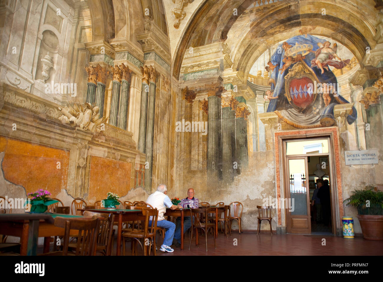 Sedile Dominova, meeting point for seniors at Piazetta Giuliani, frescoes of 18. century, old town of Sorrent, Peninsula of Sorrento, Italy Stock Photo