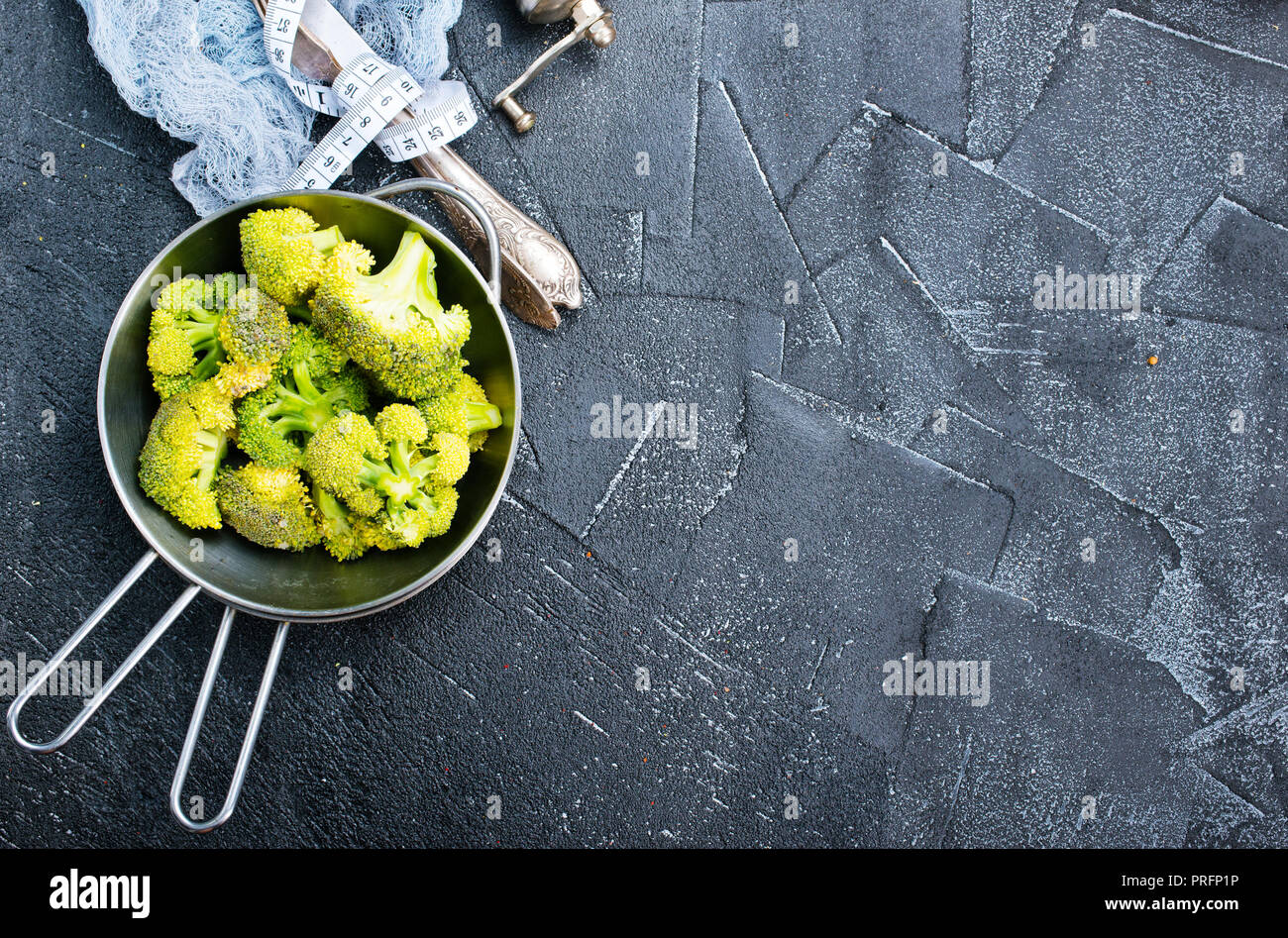 raw broccoli, diet food, fresh broccoli in pan Stock Photo Alamy
