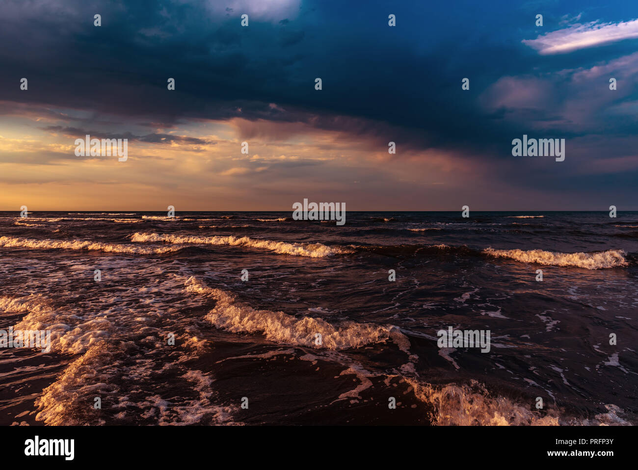 Amazing colorful sunset sky over sea Stock Photo - Alamy