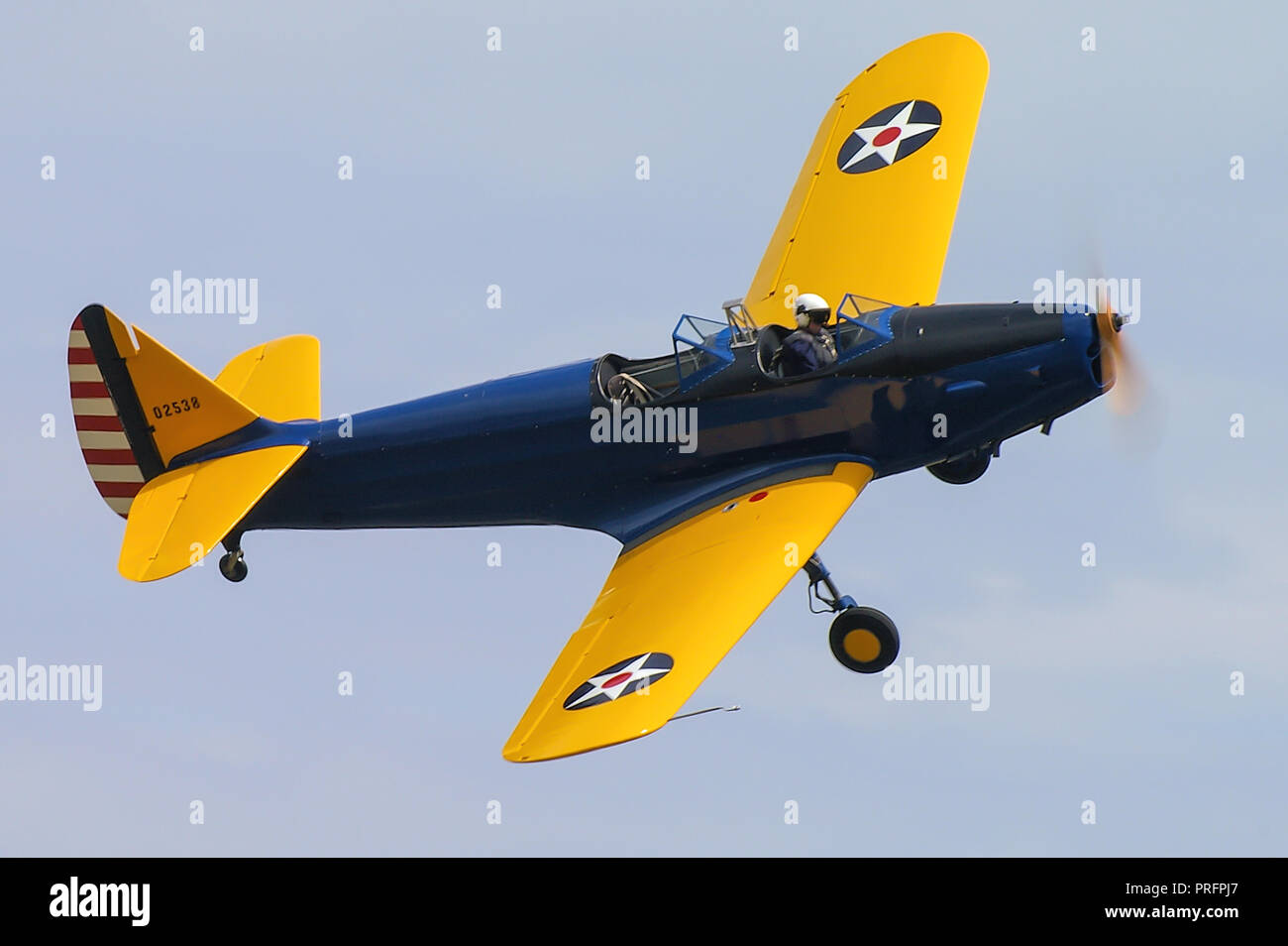 Fairchild PT-19 Cornell plane flying at an airshow. Second World War primary trainer for the United States Army Air Corps with old style markings Stock Photo
