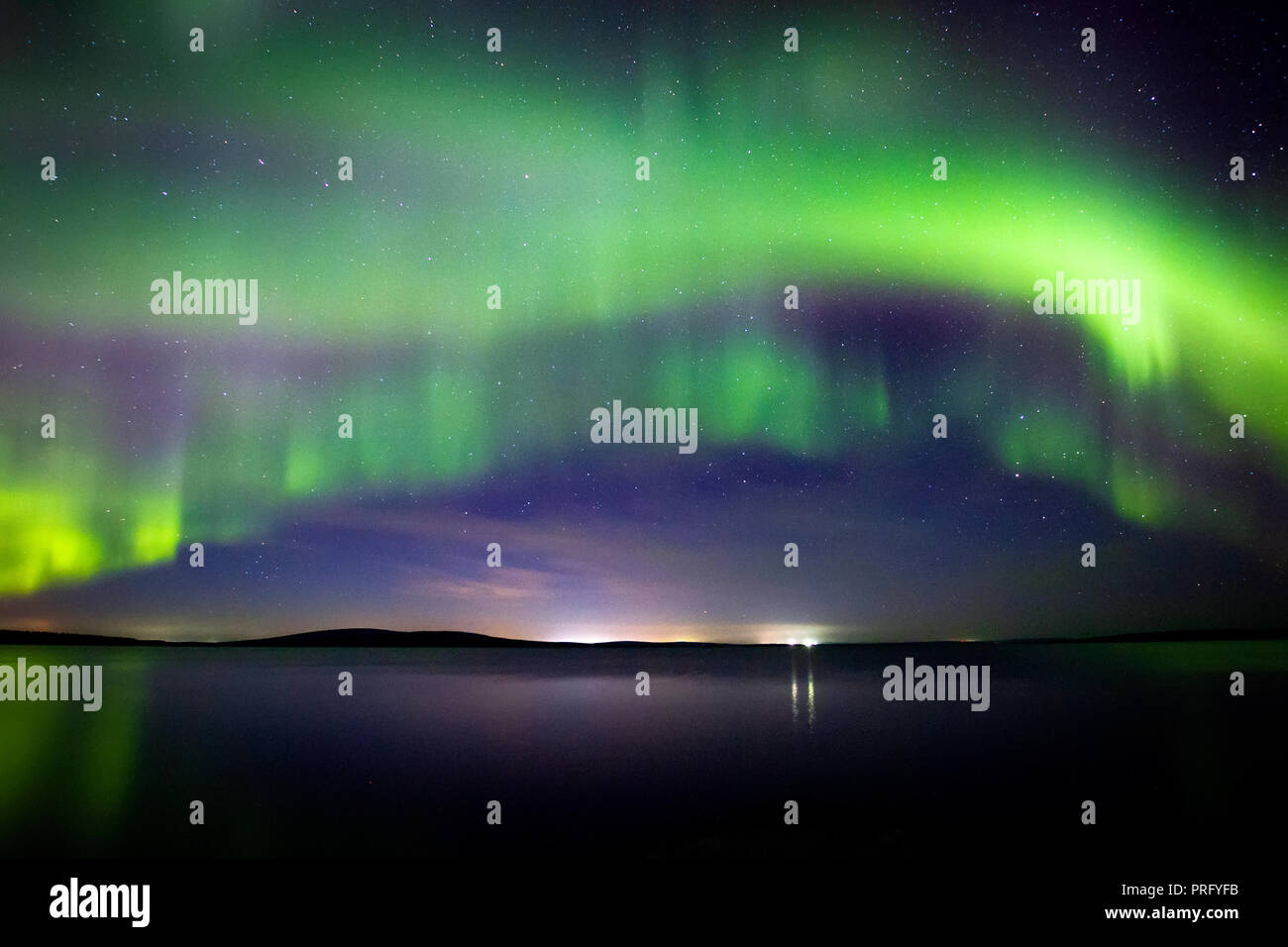 Beautiful  Northern Lights (polar lights, aurora borealis) in September (unique phenomenon) on the starry sky Stock Photo