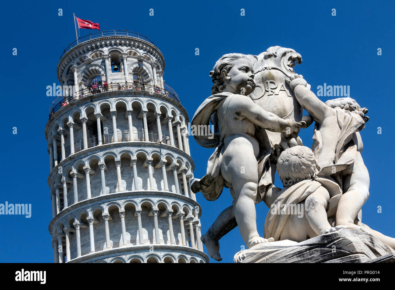 The Leaning Tower of Pisa, is the most famous image of the city of Pisa in Italy. It is one of many works of art and architecture in the city's Piazza Stock Photo