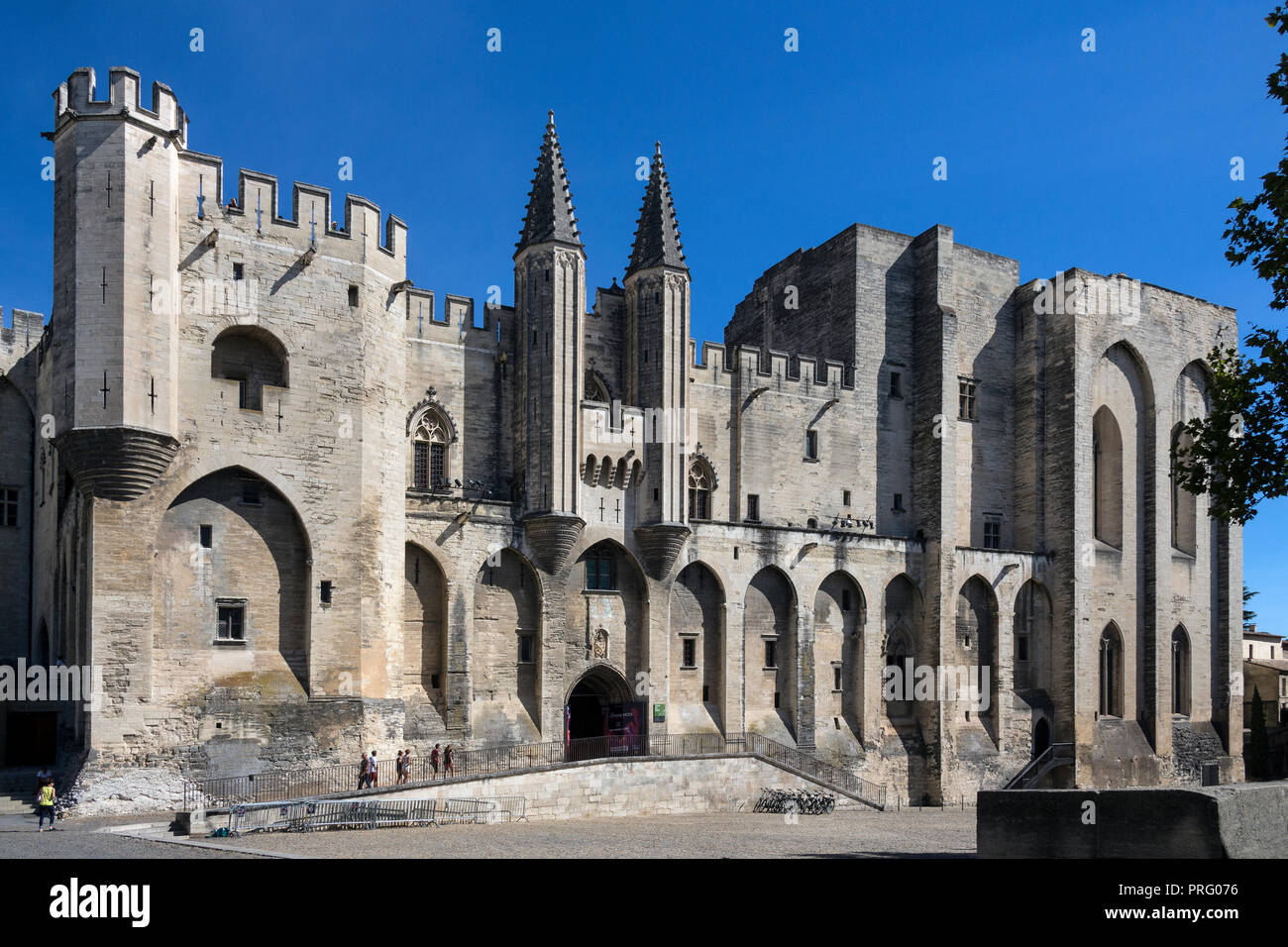 Palais des Papes in the city of Avignon, France in the department of Vaucluse on the left bank of the Rhone River. Once a fortress and palace, the pap Stock Photo