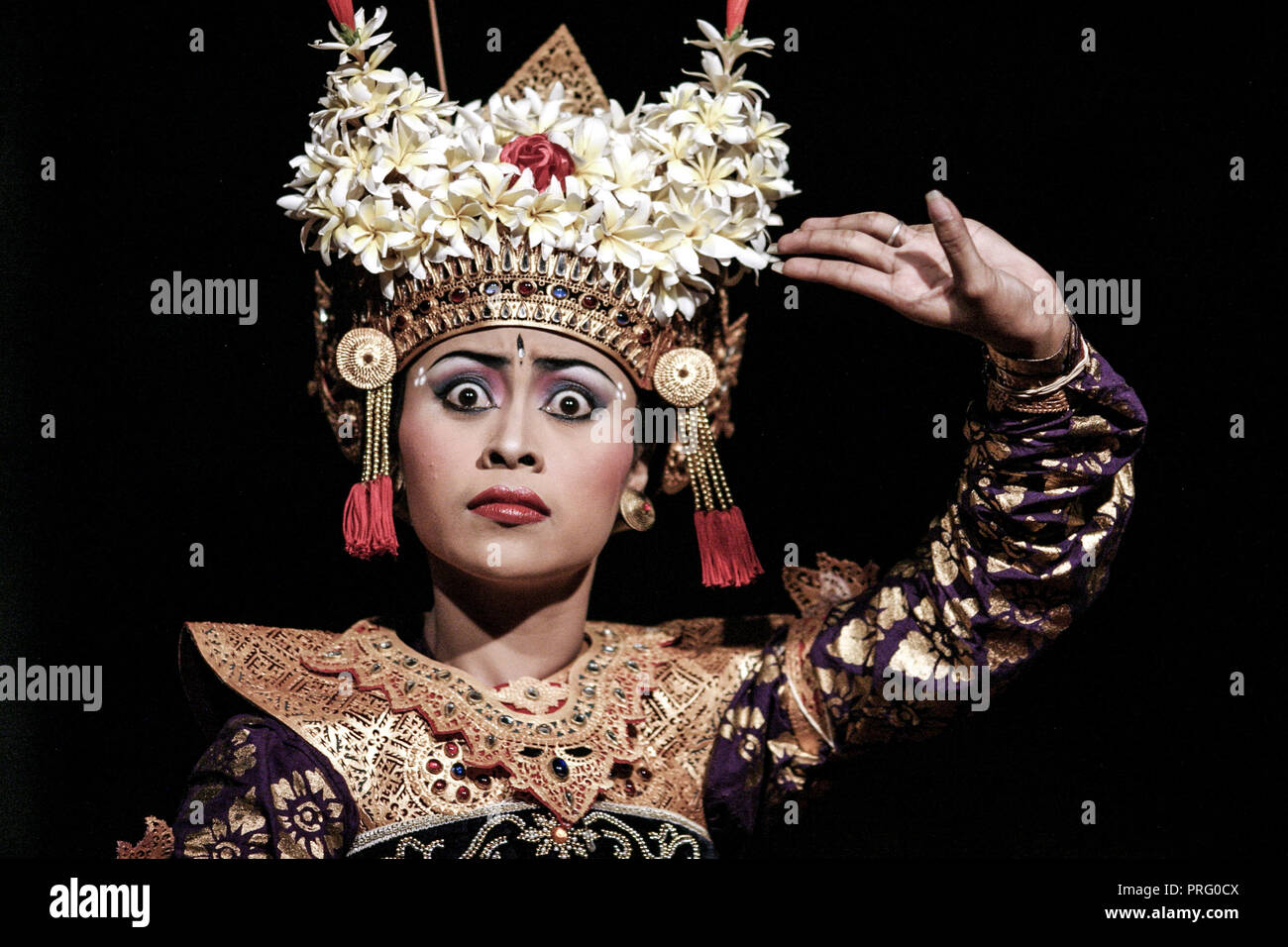 Female dancer in Balinese cultural dance performance, Denpasar ...