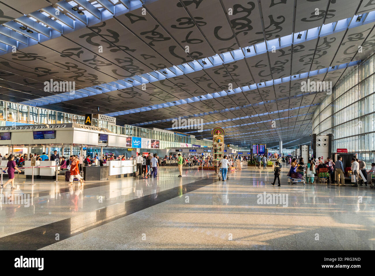 Departures check in desks, Kolkata airport, India Stock Photo