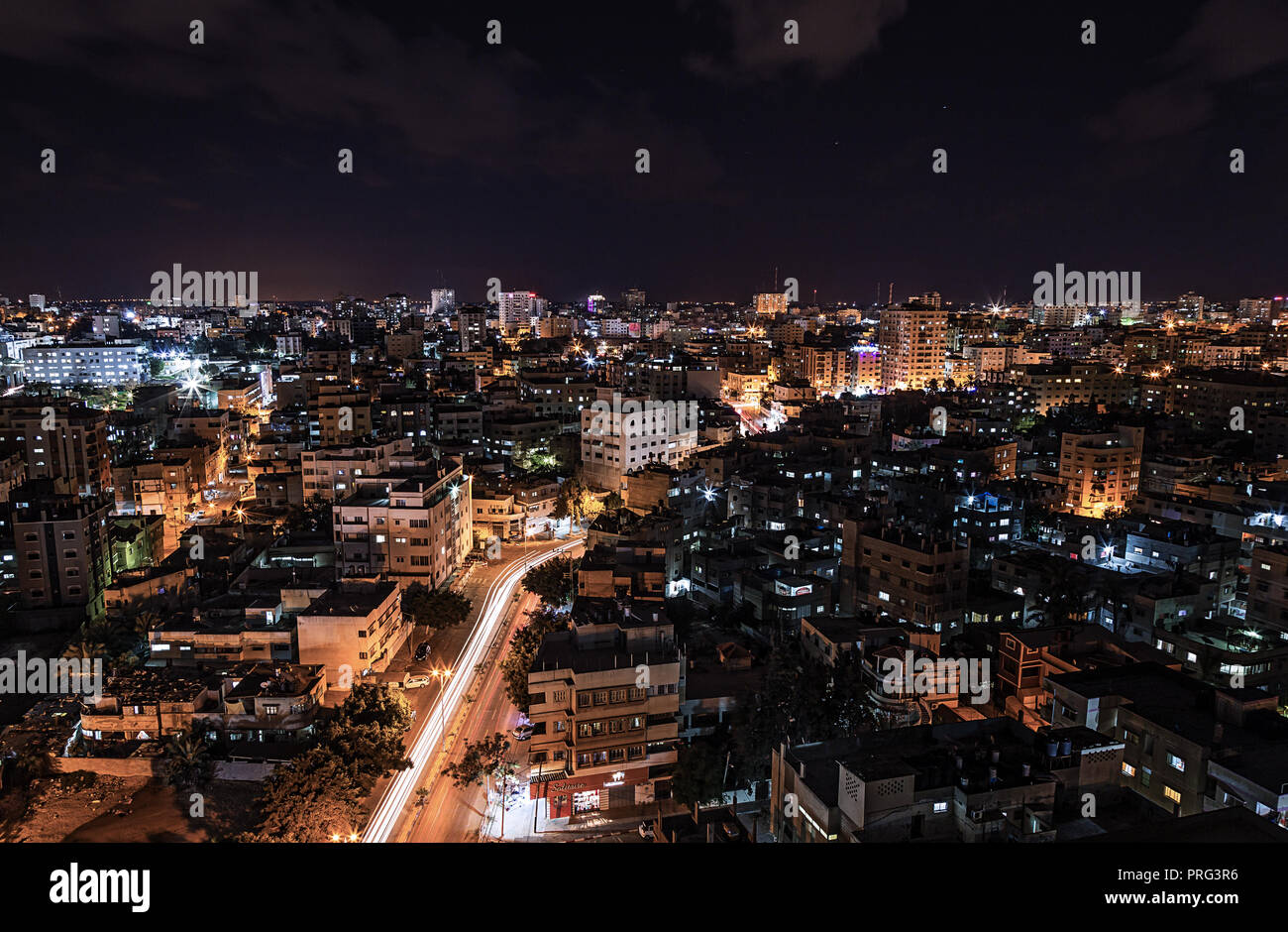 A photo of Gaza City at night. Stock Photo