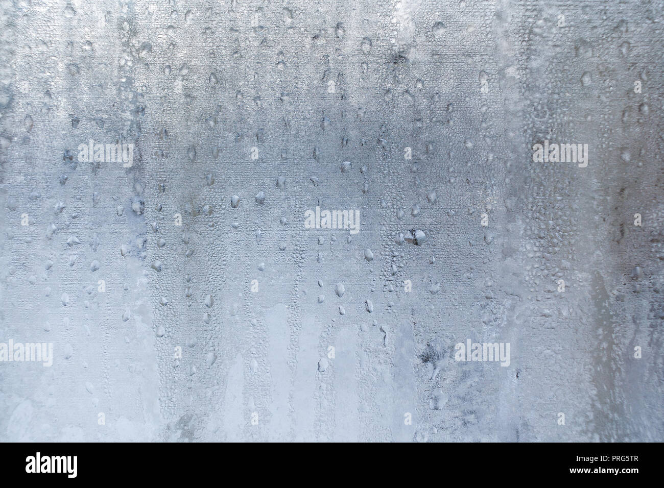 Winter background from lot of frozen water drops on window Stock Photo ...