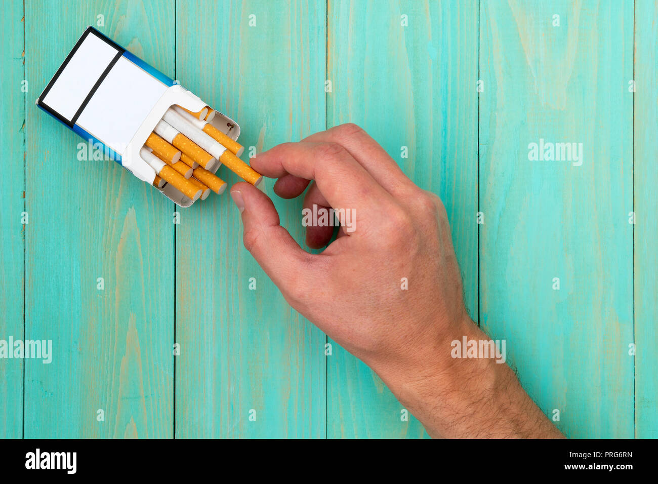 hand holding pack of cigarettes 1,236 With Packet Cigarette Royalty-Free Images, Stock Photos & Pictures Hand holding cigarette pack Images