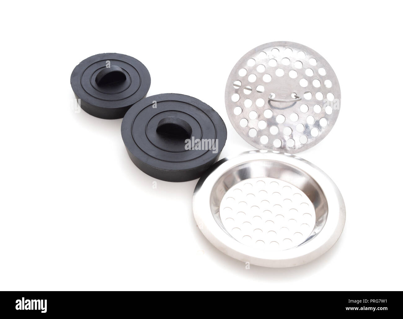 Sink strainers and black rubber domestuic plugs on white background. Stock Photo