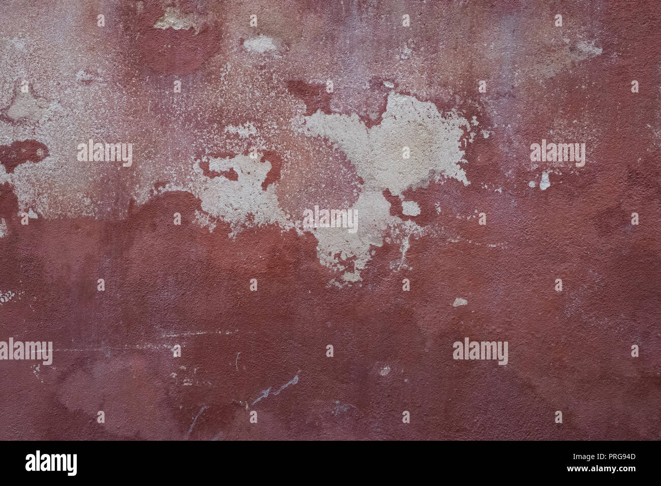 red wall background with white hides Stock Photo
