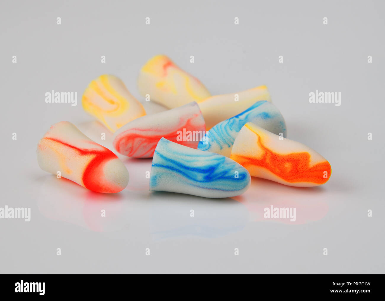 several earplugs on a white background Stock Photo