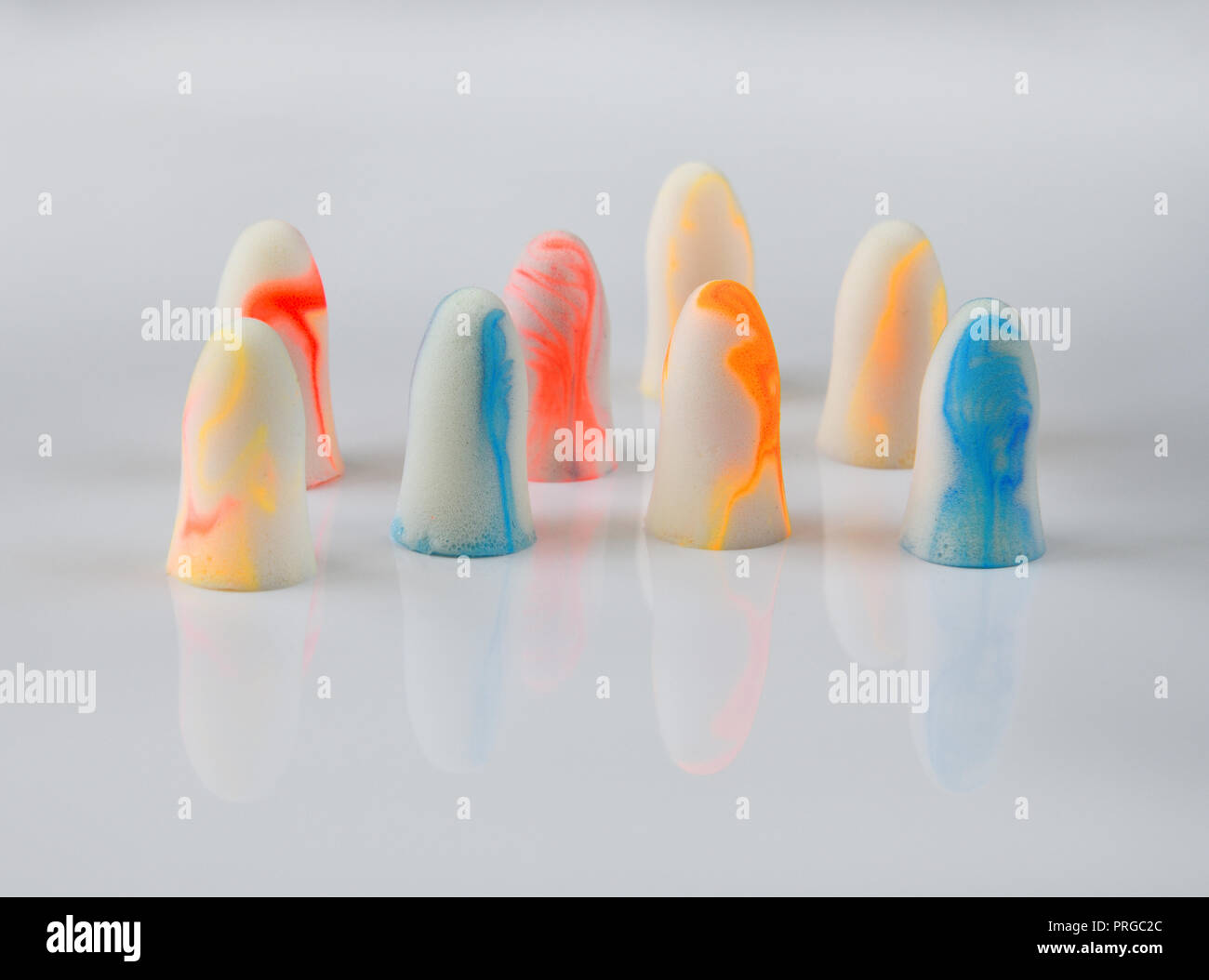 several earplugs on a white background Stock Photo