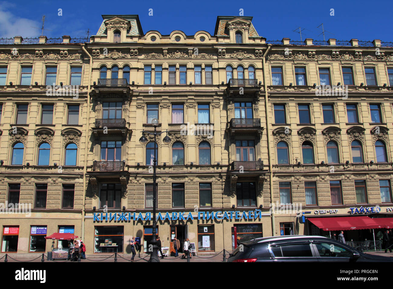 The grand façade of one of the many buildings on Nevsky Prospekt which is the main thoroughfare in St Petersburg, Russia. Stock Photo