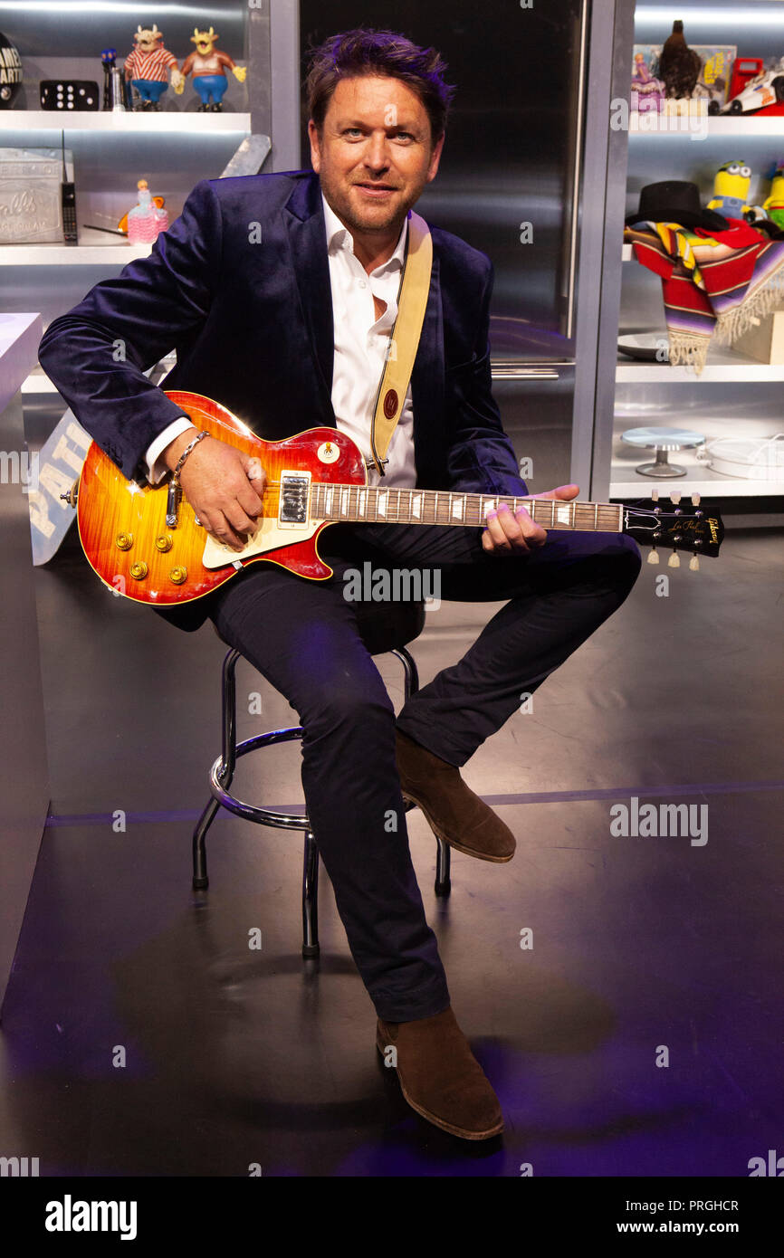 Wimbledon, London, UK. 2nd Celebrity chef and TV presenter James Martin on the set of his stage show 'James Martin On The Road Again' which is about to begin its UK tour. The show will include cookery demonstrations, banter, celebrity guests, guitar playing, prizes, and James playing his Gibson guitar. Credit: Anna Watson/Alamy Live News Stock Photo