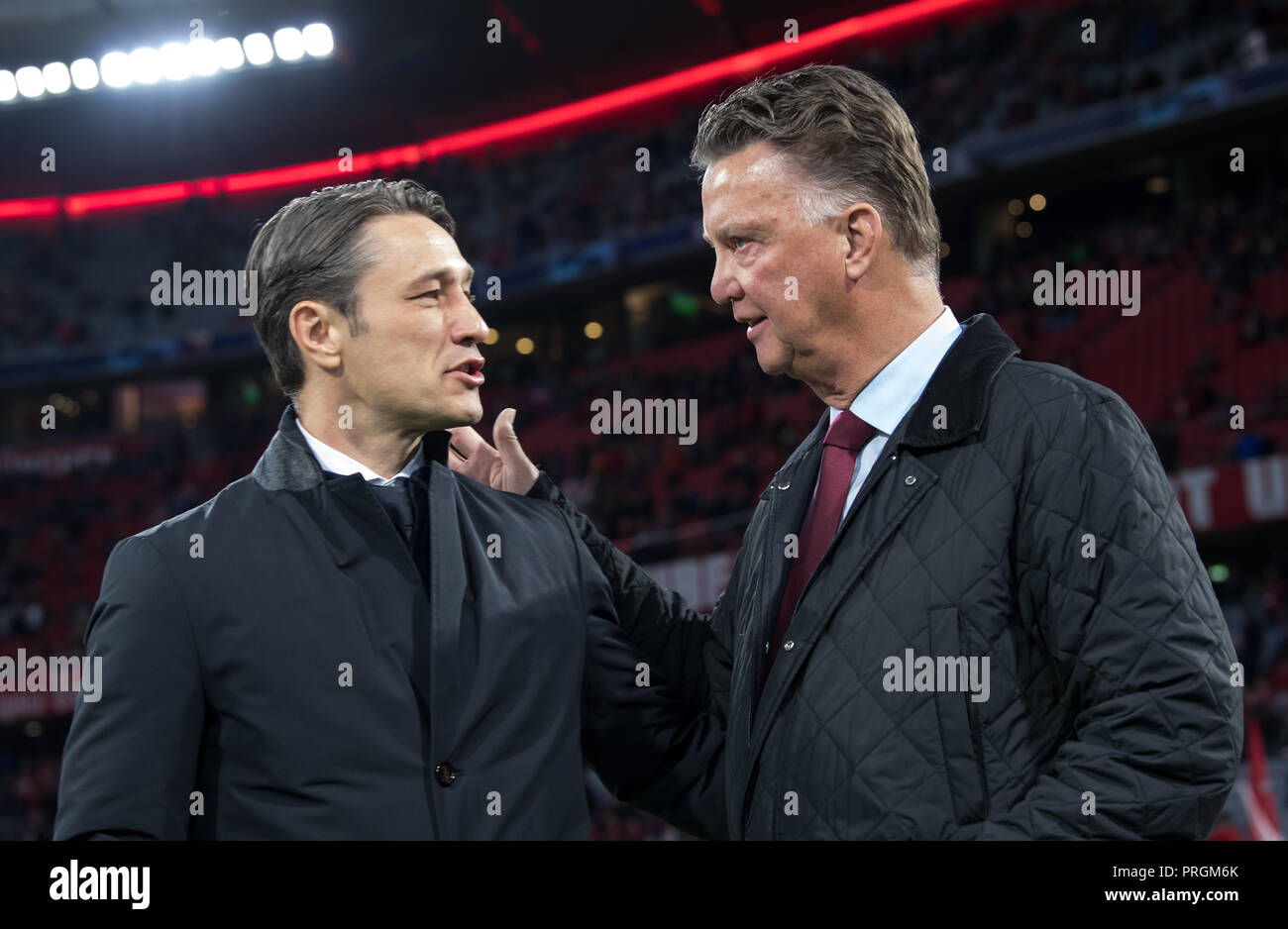 Munich, Bavaria. 2nd  Oct, 2018. Munich, Bavaria. 02nd Oct, 2018. 02 October 2018, Germany, Munich: Soccer: Champions League, Bayern Munich vs Ajax Amsterdam, Group stage, Group E, 2nd matchday in the Allianz Arena. Munich coach Niko Kovac (L) talks to former Bayern coach Louis van Gaal before the match. Credit: Sven Hoppe/dpa/Alamy Live News Credit: dpa picture alliance/Alamy Live News Stock Photo