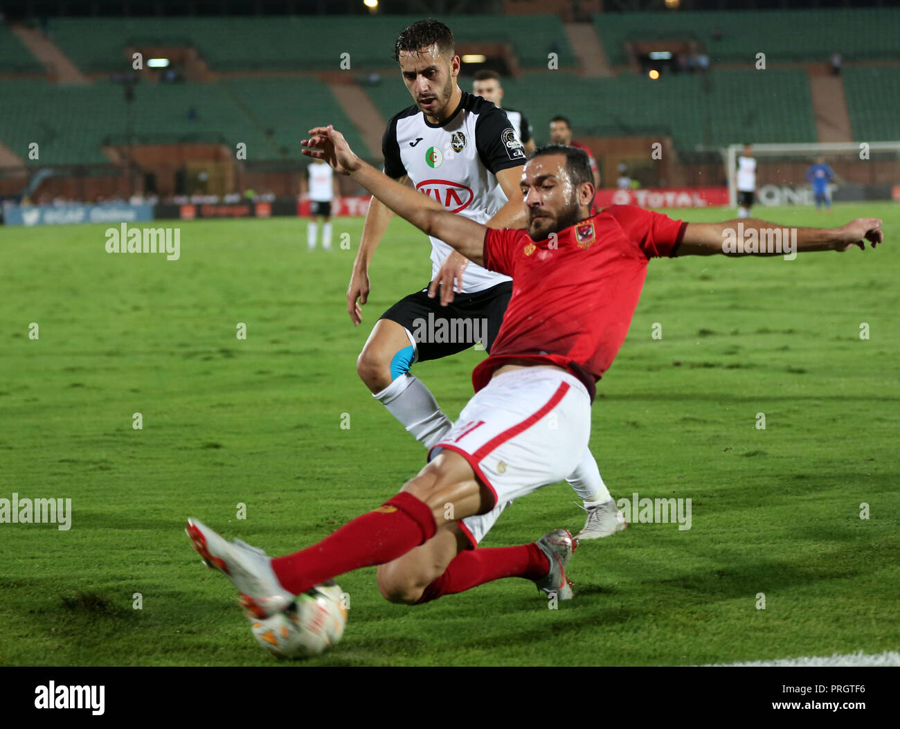 Cairo, Egypt. 2nd Oct, 2018. Ali Maaloul (Front) of Al Ahly competes during the first leg match between Egypt's Al Ahly and Algeria's ES Setif of African Champion's League semi-finals in Cairo, Egypt, on Oct. 2, 2018. Al Ahly won 2-0. Credit: Ahmed Gomaa/Xinhua/Alamy Live News Stock Photo