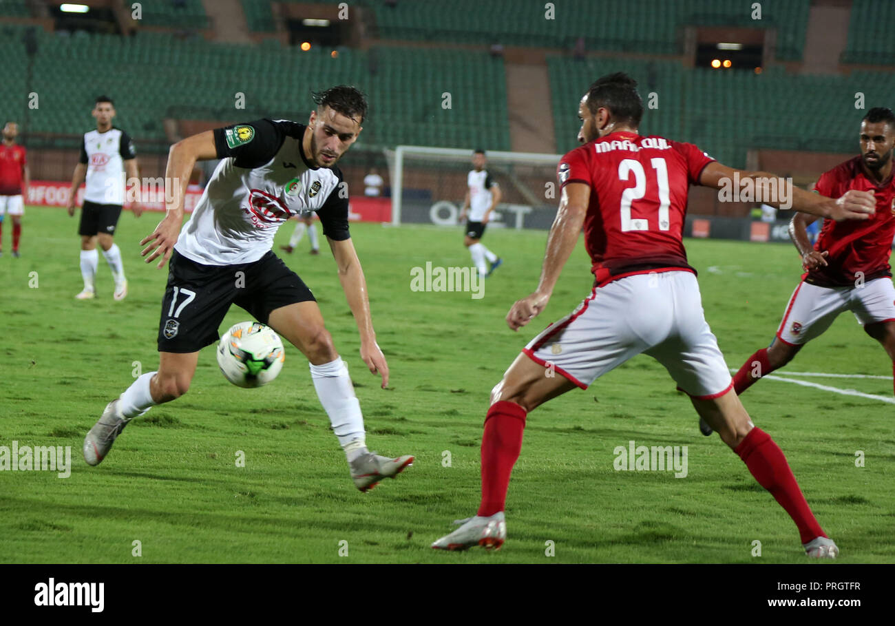 Cairo, Egypt. 2nd Oct, 2018. Radouani Saadi (L) of ES Setif competes during the first leg match between Egypt's Al Ahly and Algeria's ES Setif of African Champion's League semi-finals in Cairo, Egypt, on Oct. 2, 2018. Al Ahly won 2-0. Credit: Ahmed Gomaa/Xinhua/Alamy Live News Stock Photo