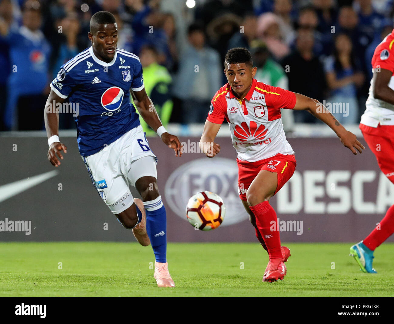 Millonarios Andres Roman R Vies For The Ball With Santa Fe S Edwin Herrera L During Their Copa Sudamericana Soccer Match Between Colombian Teams Millonarios And Santa Fe At El Campin Stadium In