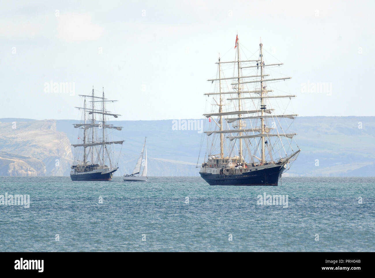 Weymouth Bay, Dorset, UK. 3rd October, 2018. Tall Ships in a sunny Weymouth Bay, Dorset Credit: Finnbarr Webster/Alamy Live News Stock Photo