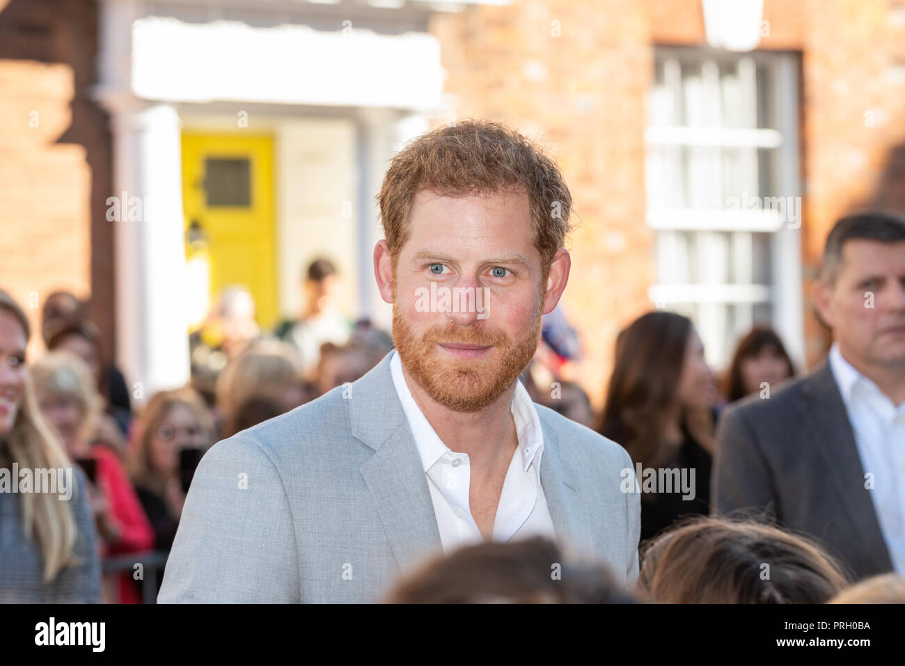 Chichester, West Sussex, UK. 3rd October 2018. The Duke of Sussex, Prince Harry talks with school children during his and Meghan Markle's visit to Chichester. Credit: Scott Ramsey/Alamy Live News Stock Photo