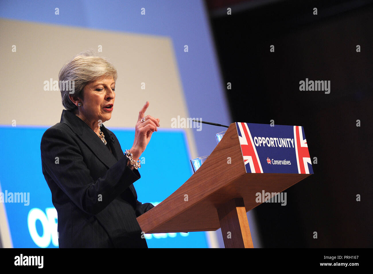 Birmingham, England. 3rd October, 2018.  Theresa May MP, Prime Minister and Leader of the Conservative Party, delivers her keynote speech to conference on the closing session of the fourth day of the Conservative Party annual conference at the ICC.  Kevin Hayes/Alamy Live News Credit: Kevin Hayes/Alamy Live News Stock Photo
