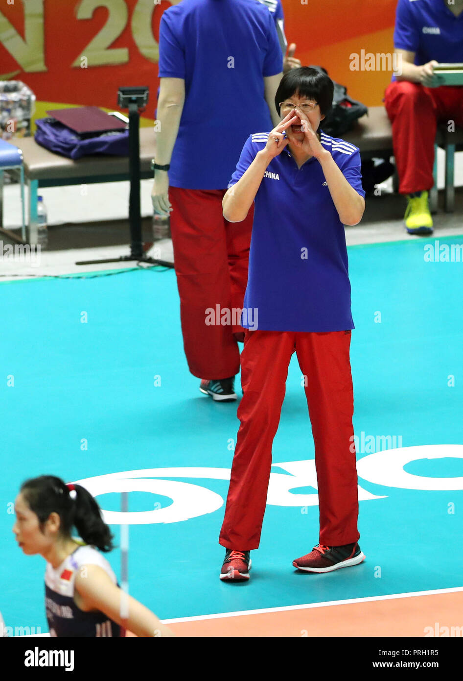 Sapporo, Japan. 3rd Oct, 2018. Lang Ping, coach of China, gives instructions during the Pool B match against Bulgaria at the 2018 Volleyball Women's World Championship in Sapporo, Japan, Oct. 3, 2018. China won 3-1. Credit: Du Xiaoyi/Xinhua/Alamy Live News Stock Photo