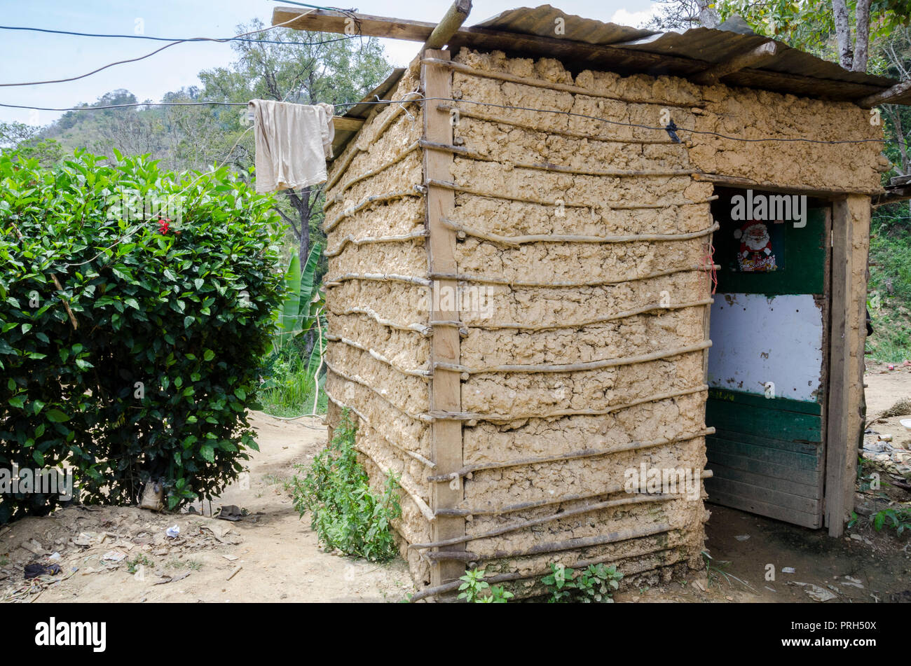Bathroom or sanitary latrines made of bahareque (houses from sticks or reeds interwoven and mud covering them) are normally used in rural areas. Extre Stock Photo