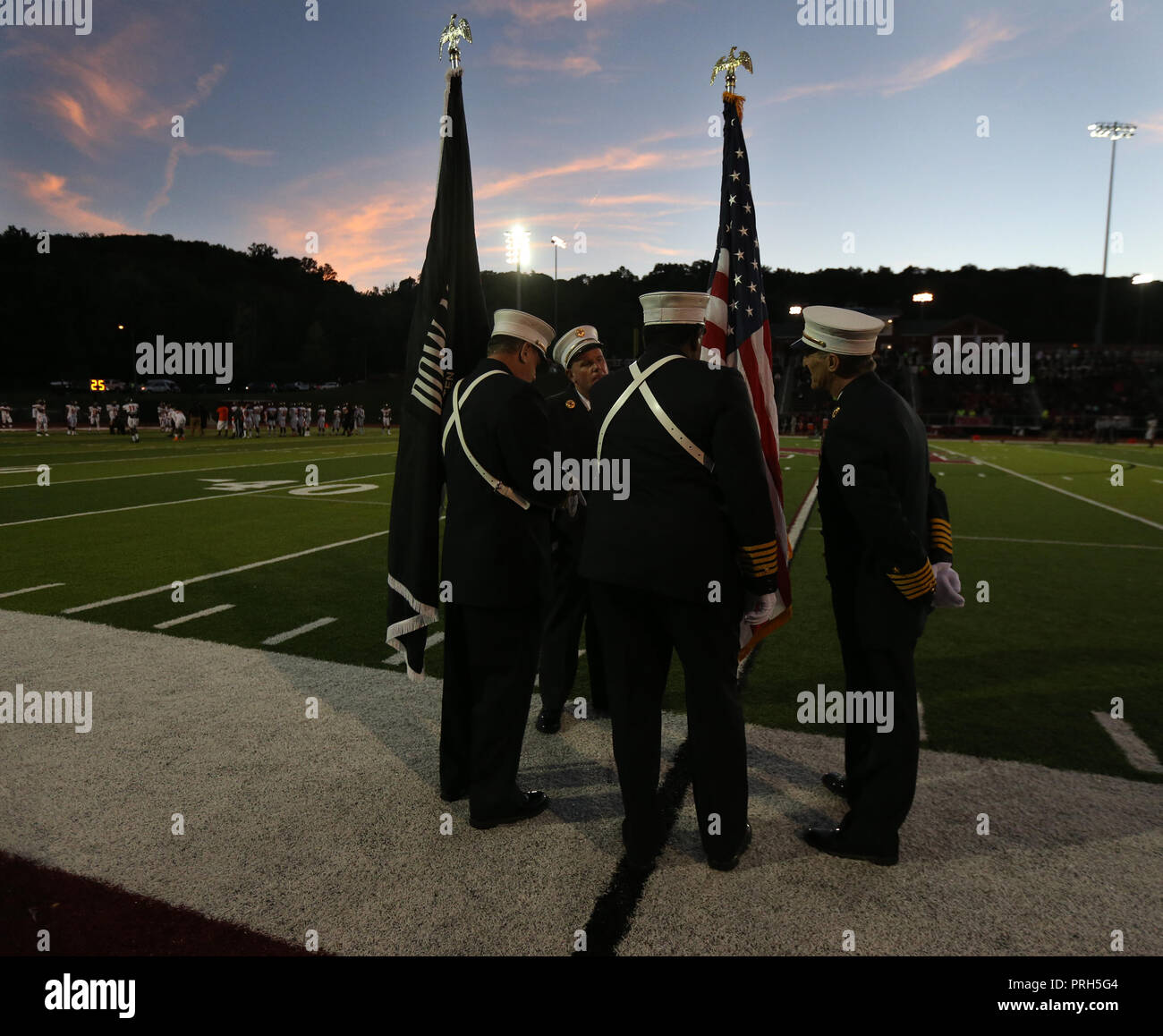 Color guard at a high school football game Stock Photo
