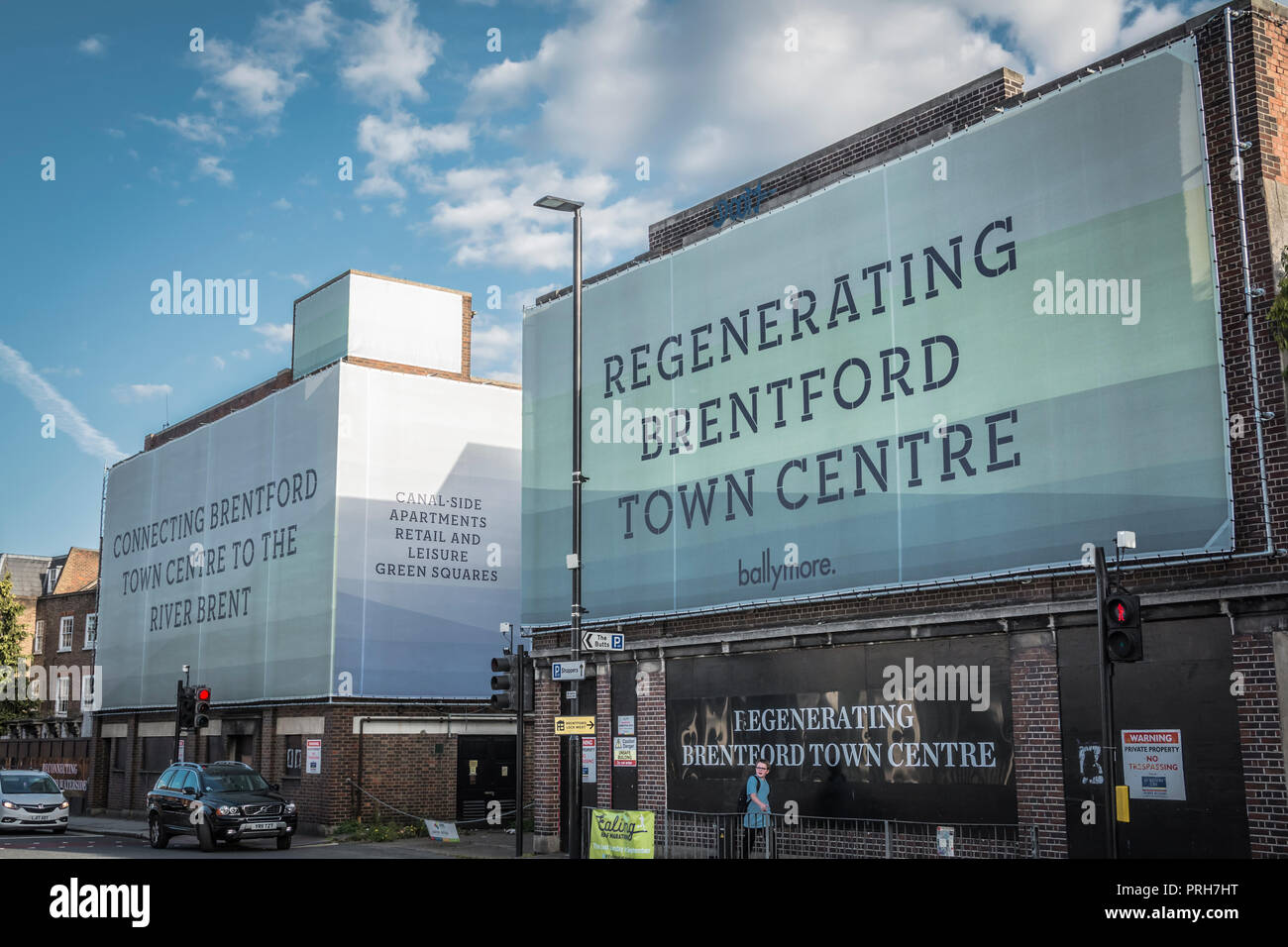 A Ballymore 'Regenerating Brentford Town Centre' hoarding on Brentford High Street, Brentford, London, UK Stock Photo